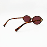 Miu Miu Round Tortoiseshell Sunglasses with Pink Lenses - Image 3